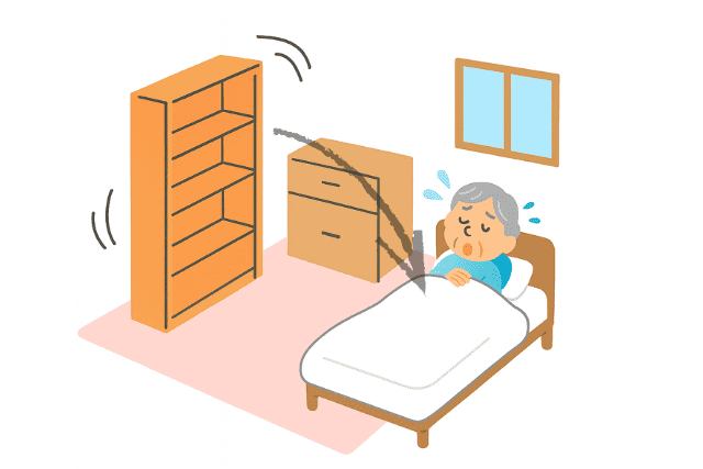 寝室で就寝中に、背の高い家具が倒れて下敷きになる危険を示したイラスト